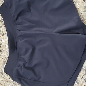 Womens athletic shorts with zipper pocket in back